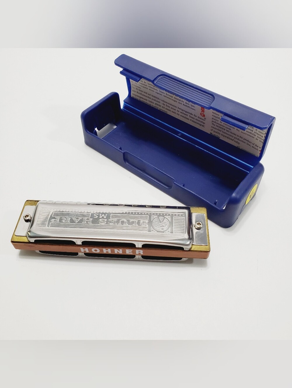 Hohner E Blues Harp Harmonica With Case.